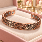 Close-up of the Florence Vine Bracelet in copper tone on the ivory insert of an Audrey Roman Jewels box.