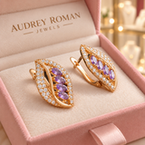 Imogen Earrings (rose-gold-tone) in a close detail view inside the Audrey boutique.
